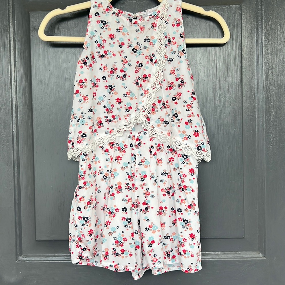Girls Justice Floral Romper Size 7. Like New. Open back button closure.